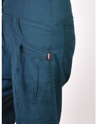 Petrolejové kalhoty s kapsami, spirálová výšivka, zapínání na zip a knoflíky