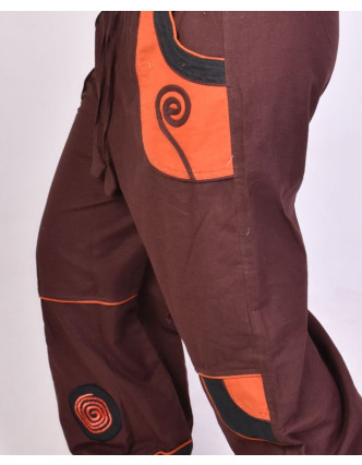 Hnědo-oranžové unisex kalhoty se spirálou, kapsy, elastický pas
